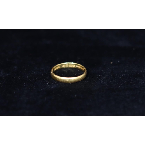 337 - A 22ct gold wedding ring, stamped 