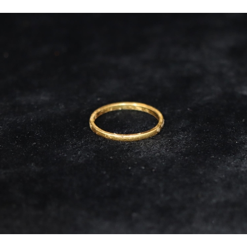 349 - A 22ct gold wedding ring