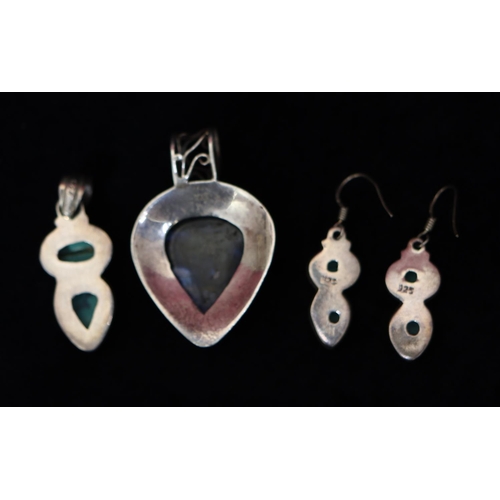 355 - A 925 silver heart shaped pendant set with hardstone, a 925 silver pendant set with 2 green stones a... 