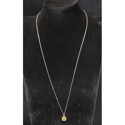 356 - A small gold Mexican coin set in a pendant, with 9ct gold chain, overall weight 1.5 grams