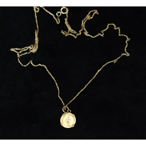 356 - A small gold Mexican coin set in a pendant, with 9ct gold chain, overall weight 1.5 grams