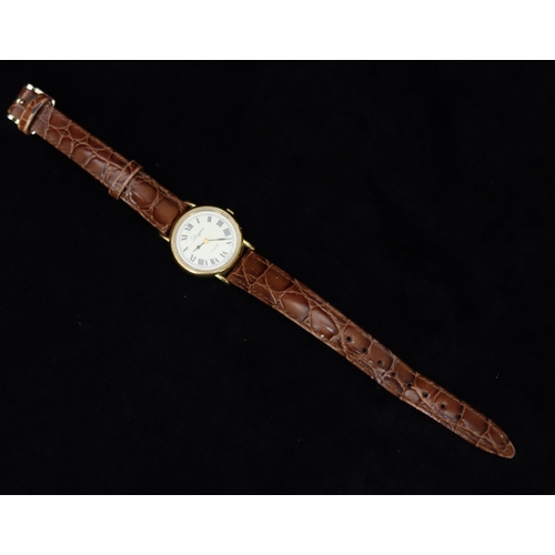 357 - A ladies' Longines circular quartz wristwatch with cream dial and Roman numerals, brown leather stra... 