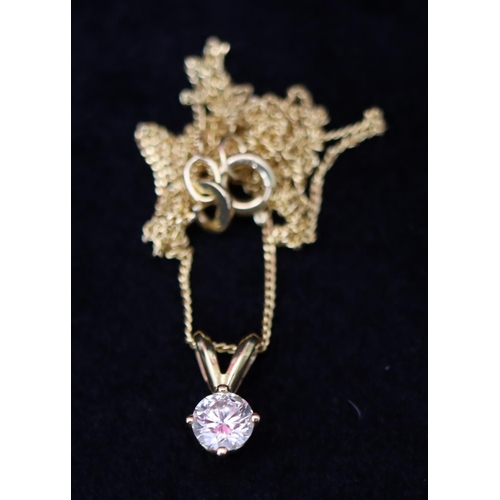 362 - An 18ct gold pendant set with a diamond, approx. 0.50ct, with silver gilt chain