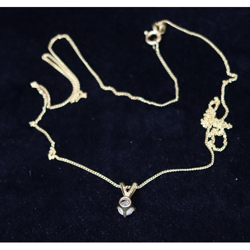 362 - An 18ct gold pendant set with a diamond, approx. 0.50ct, with silver gilt chain