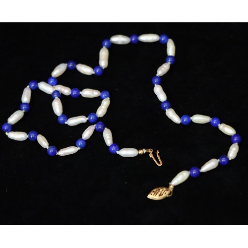 364 - A freshwater pearl and Lapis Lazuli bead necklace with 14ct gold clasp, 44.5cm long