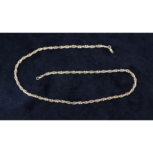 376 - A 14ct gold twist chain, 42cm long, 9.1 grams