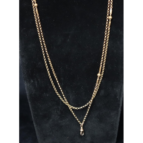 378 - A 9ct gold guard chain with ball and bar mounts and single clip, 72.5cm long, 11.7 grams