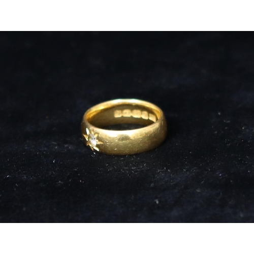 380 - A 22ct gold wedding ring set with clear stone, Size M/N, 9.4 grams gross