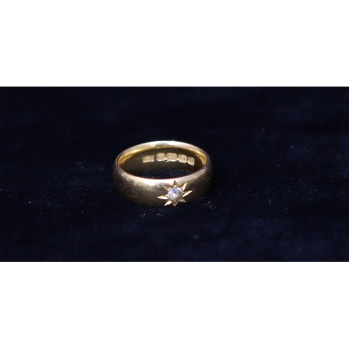 380 - A 22ct gold wedding ring set with clear stone, Size M/N, 9.4 grams gross