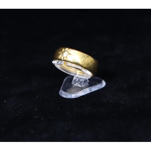 380 - A 22ct gold wedding ring set with clear stone, Size M/N, 9.4 grams gross