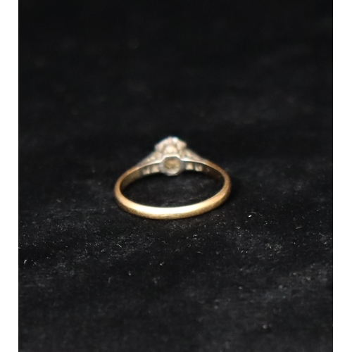 381 - A gold solitaire diamond ring, approx. 0.60ct, set with 6 small diamonds to shoulders, Size 0, 2.5 g... 