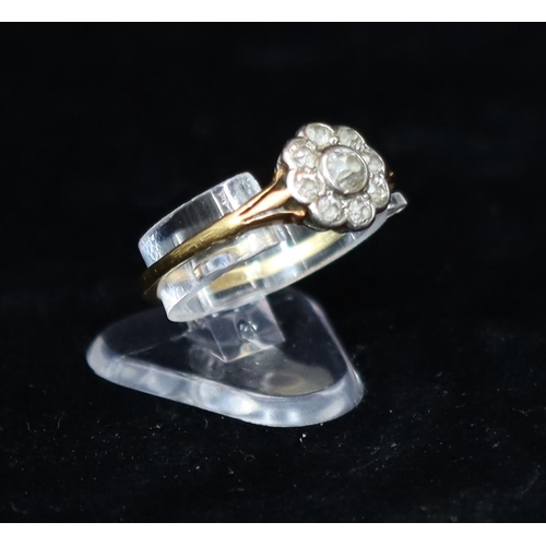 392 - An 18ct gold cluster ring set with centre diamond, surrounded by 8 smaller diamonds, Size R, 2.5 gra... 