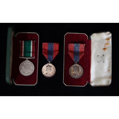 404 - 2 Elizabeth II Imperial Service medals (1 boxed) and a Woman's Voluntary Service medal (boxed) (3)