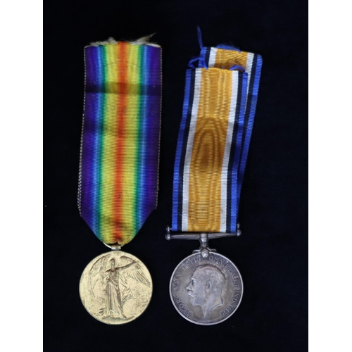 410 - A pair of WWI Military medals, 1914-18 medal and a war medal 