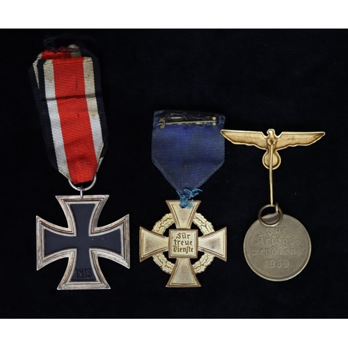 411 - A 1939 German WWII Iron Cross Second Class with ribbon, a German Faithful Service Decoration medal, ... 