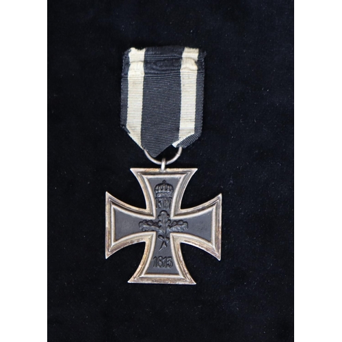 413 - A WWI German Iron Cross Second Class (with ribbon)