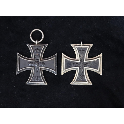 414 - 2 WWI German Iron Cross Second Class medals (1 with ring but no ribbons) (2)