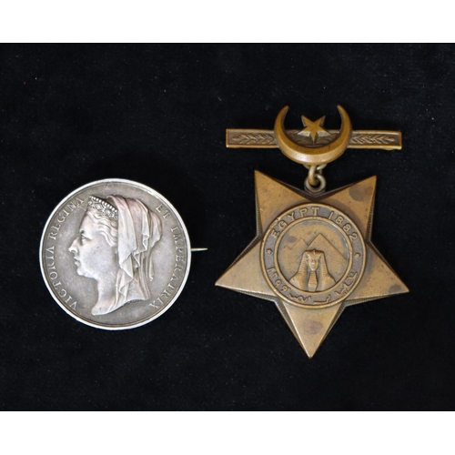 416 - A Victorian Egyptian 1882 medal (converted to brooch) 