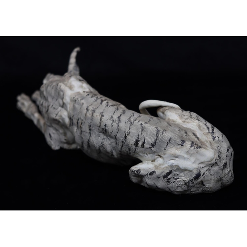 43 - A Studio glazed earthenware model of a resting Greyhound with embossed monogram, 50cm long
