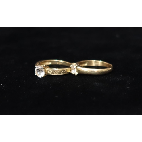 438 - A 9ct gold ladies' solitaire ring set with clear stone, Size O/P, a similar 9ct gold solitaire ring,... 