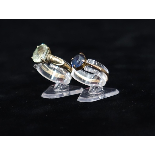 439 - A 9ct gold ladies' ring set with pale blue stone, Size P, a 9ct gold ladies' ring set with blue ston... 