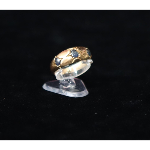 444 - A 9ct gold ladies' ring set with 3 sapphires, Size M/N, 3.4 grams gross