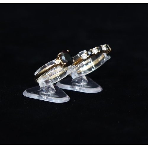 446 - A 9ct gold ladies' ring set with blue and clear stones, Size T, a 9ct gold ladies' ring set with sap... 