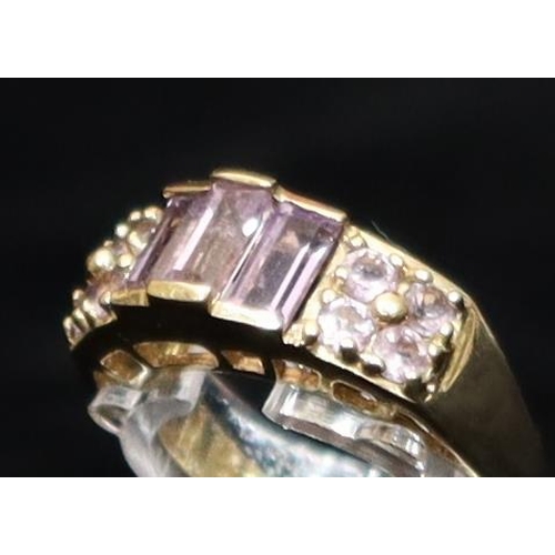 448 - A 9ct gold ladies' cluster ring set with purple and clear stones, Size N/O, 3.9 grams gross