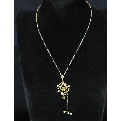 465 - A 15ct gold drop pendant set with 2 green stones interspersed with half pearls, with gold chain, 5.8... 