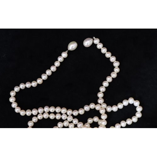 469 - A cultured pearl and bead chain, 90cm long