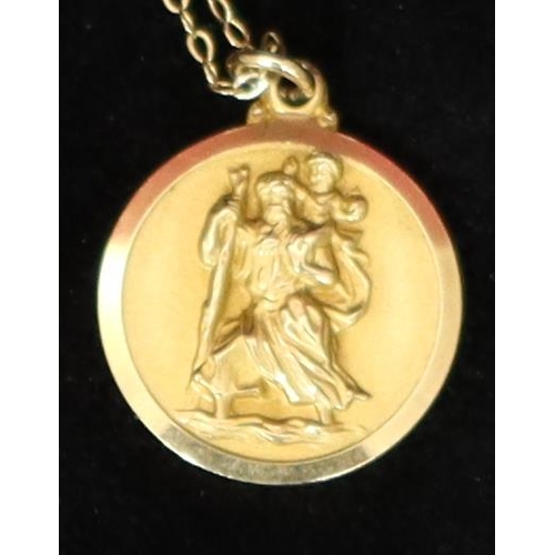 473 - A 9ct gold circular St. Christopher with chain, 3.7 grams