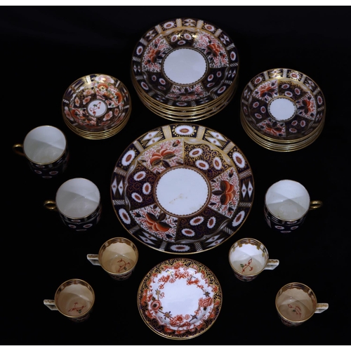 48 - 4 early Derby Imari pattern cups and 5 matching saucers, 2 Royal Crown Derby small side plates and a... 