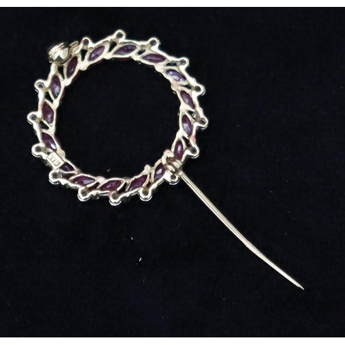 480 - A 9ct gold Garland brooch set with small rubies and diamonds, 2.7cm diameter, 3 grams gross