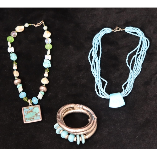 487 - A turquoise and silver multi bead necklace, a silver coloured metal and turquoise expanding bracelet... 