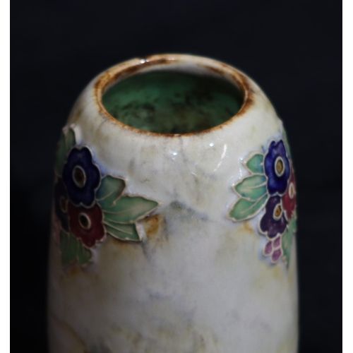 49 - A Royal Doulton glazed earthenware bulbous shaped vase with multicoloured floral and leaf decoration... 