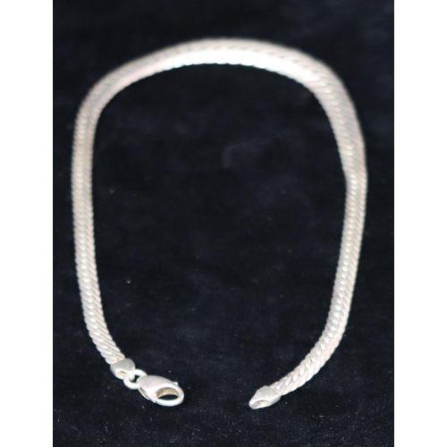 490 - A silver flat graduated choker necklace, 40.3 grams