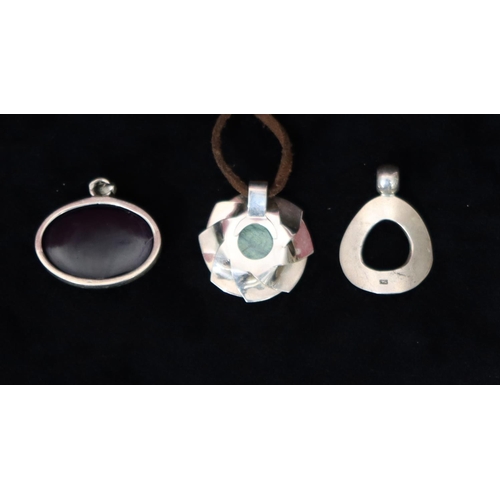 493 - 3 silver pendants, 1 with suede cord (3)