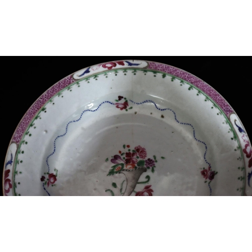 50 - A pair of 18th Century Newhall plates on white and puce ground with coloured floral and leaf decorat... 