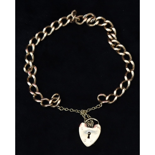 506 - A 9ct gold linked bracelet with padlock clasp, 18.2 grams