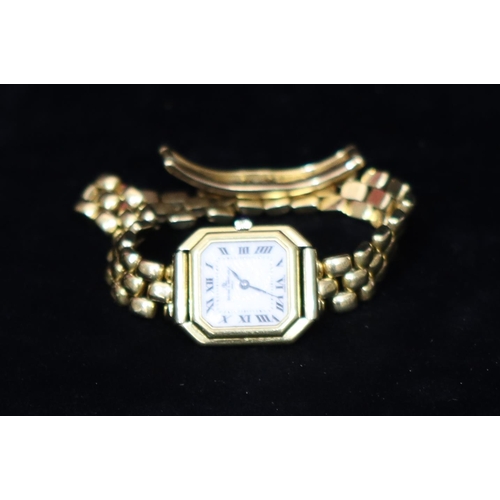 509 - Baume & Mercier 18ct gold ladies' wristwatch with white square dial and Roman numerals, matching str... 