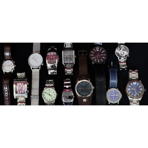 518 - Ben Sherman wristwatch and 11 various modern wristwatches, all in brown leather jewellery case