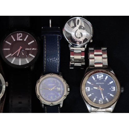 518 - Ben Sherman wristwatch and 11 various modern wristwatches, all in brown leather jewellery case