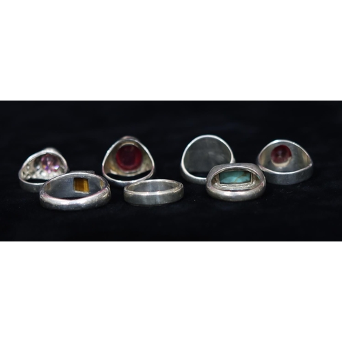 520 - 7 various silver rings set with various stones, 57.8 grams gross (7)