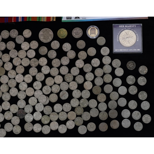 522 - A quantity of post 1947 Sixpences, an Olympics Sports 5 Dollar proof coin, etc.