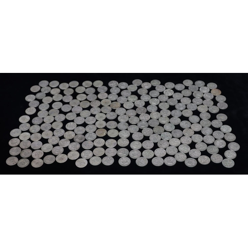 527 - A quantity of various pre-1947 Shillings, 1106 grams