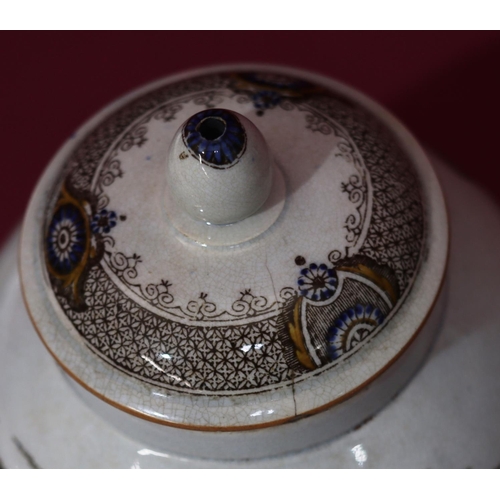 54 - A Newhall round bulbous shaped teapot with multicoloured Willow Pattern decoration (crack to rim and... 
