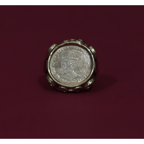 568 - A ladies' gold ring set with Egyptian coin with pierced shoulder, Size L/M, 2.2 grams