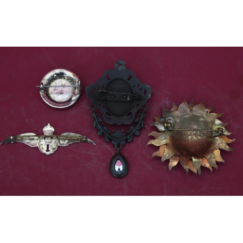 597 - A silver RAF winged brooch and 3 various brooches (4)