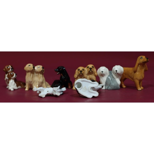 62 - 8 various small Beswick figures of dogs, largest 7cm high