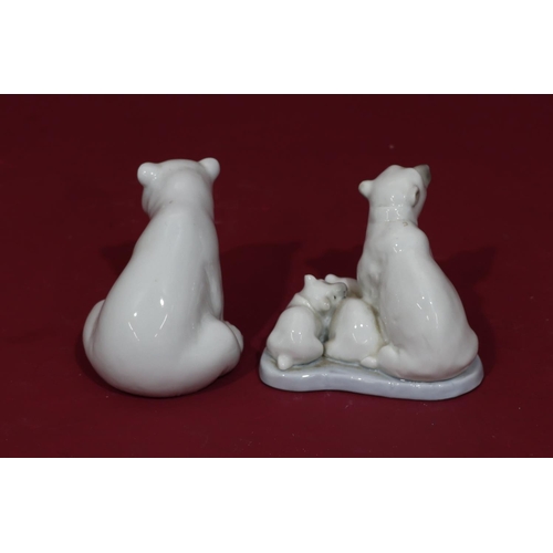 63 - A Lladro group of polar bear and pups, 8.2cm high and a Lladro figure of a seated polar bear (2)